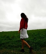 Girlie feeling cold takes a quick leak on a field