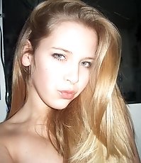 Chick in rubber and sexy nightie plays around