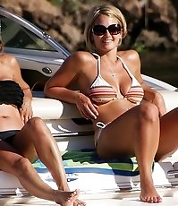 Slutty chicks wearing tiny swimsuits