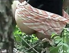 Cam hidden in woods films peeing girl in close-up