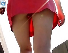 Sneaky upskirt video filmed by hunter following a cutie