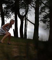 Shameless cute hoochie makes piddle alfresco