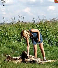 Blonde teen pissing in the park
