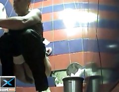 Voyeur hiding in public loo films unsuspecting hoes