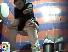 Two sexy girls peeing in front of perverted voyeur