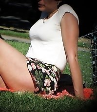 Lifting skirt up and shaking booty