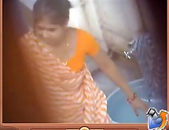 Housewife caught by doing household work