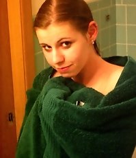 College bimbo relaxing and dancing near the mirror