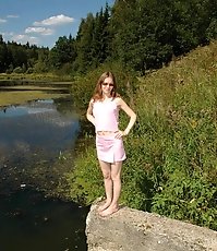 Young bitch shot pissing straight into the river