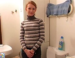 Amateur blondie gets filmed urinating in the loo