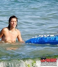 Cute nudist babe hiding in bushes