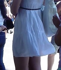 Pics wind blowing up skirts. Slim blondie caught
