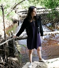 Spy busts a hot young chick pissing into the river